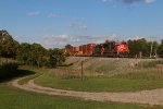 CN 3236 & 3078 lead Z149 west under a beautiful evening sky